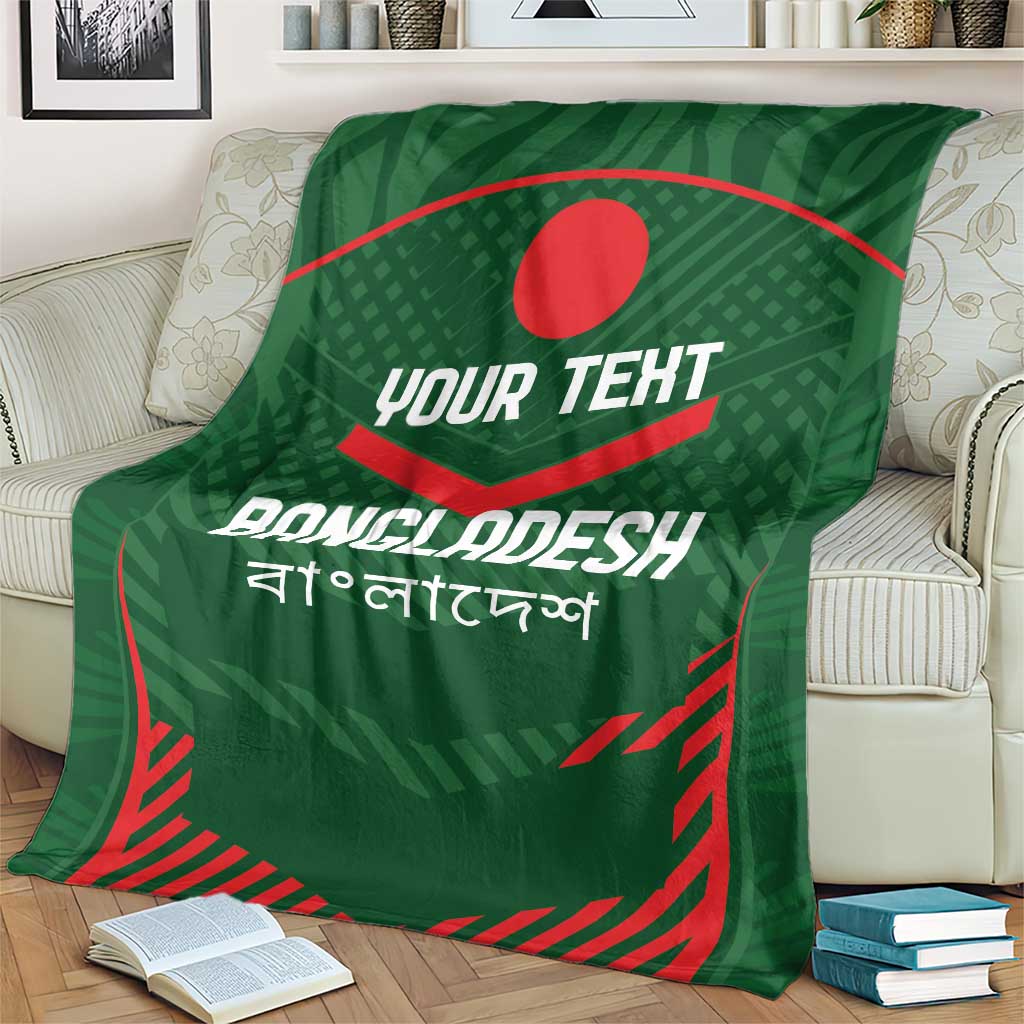 Green Bangladesh cricket blanket on cream sofa, red emblem and custom text.