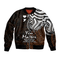Unisex bomber jacket with black and gold tribal graphic, heart motifs