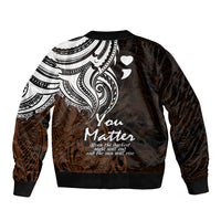 Unisex bomber jacket with black and gold back tribal print and heart motifs