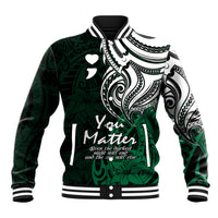 Green varsity baseball jacket with black/white tribal print, striped collar, snap front