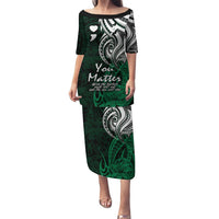Green Polynesian tribal print long dress with short sleeves and crew neckline, front view