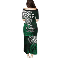 Green Polynesian tribal print long dress with short sleeves and wide neckline, back view