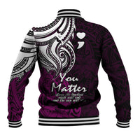 Pink baseball jacket with black-and-white tribal graphic on back, striped cuffs and hem ribbing