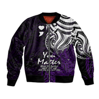 Purple bomber jacket with black collar, tribal print, hearts, and front zip detail
