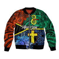 Unisex bomber jacket with black ribbed trim and green orange blue Polynesian-style graphic