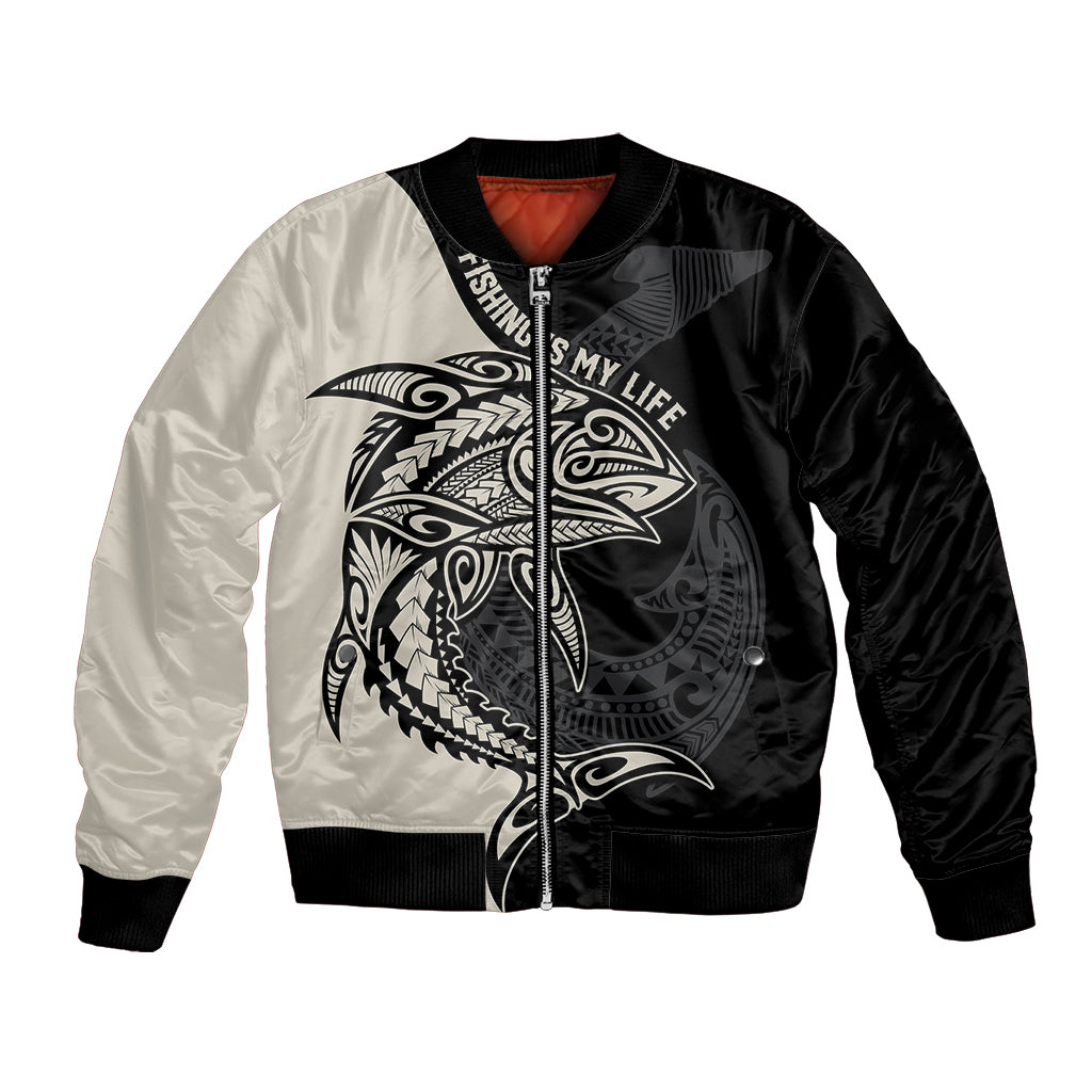 Unisex black and white bomber jacket with front zipper and large Polynesian fish hook graphic