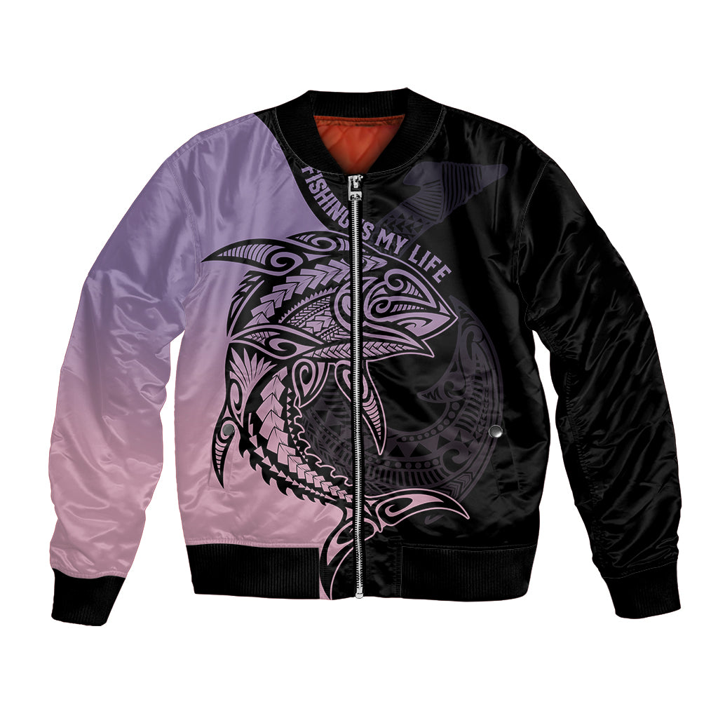 Bicolor bomber jacket with zip front, ribbed cuffs, and pastel fish-hook Maori graphic