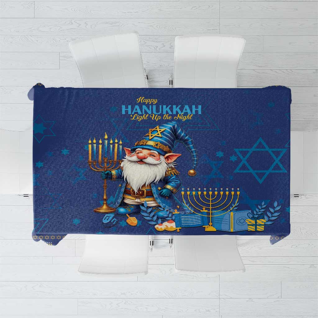 Blue Hanukkah tablecloth with gnome, Star of David, and menorah motifs in gold and teal