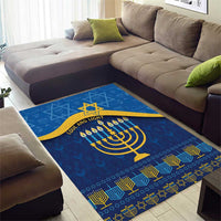 Blue Hanukkah area rug with yellow menorah and Star of David, geometric border