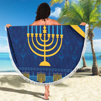 Blue round Hanukkah beach blanket with yellow menorah and Star of David, fringed border