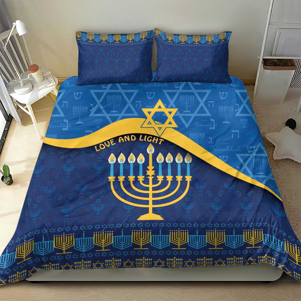 Blue bedding set with menorah and star of David motif, gold sash detail, two matching pillowcases