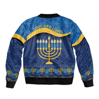 Unisex blue bomber jacket, back print 'LOVE AND LIGHTS' with menorah and candles