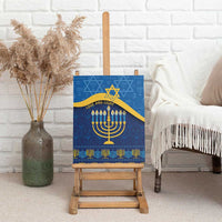 Blue Hanukkah canvas wall art on a wooden easel with menorah candles and “Love and Light”.