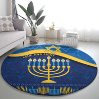 Blue round Hanukkah carpet with gold menorah, candles, and star motifs