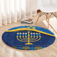 Blue round Hanukkah carpet with gold menorah and “Love and Light” ring text