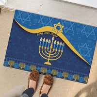 Blue Hanukkah rubber doormat with gold menorah, Star of David, and "Love and Light"