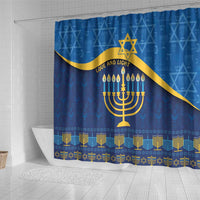 Blue Hanukkah shower curtain featuring gold menorah, Star of David, and decorative bands
