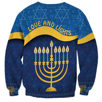 Blue Hanukkah sweatshirt with 'LOVE AND LIGHTS' text and menorah