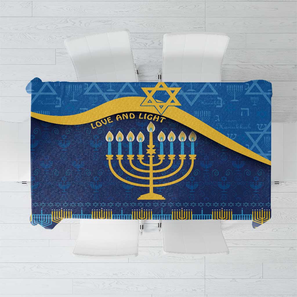 Blue Hanukkah tablecloth with gold menorah, star of David, and geometric motifs