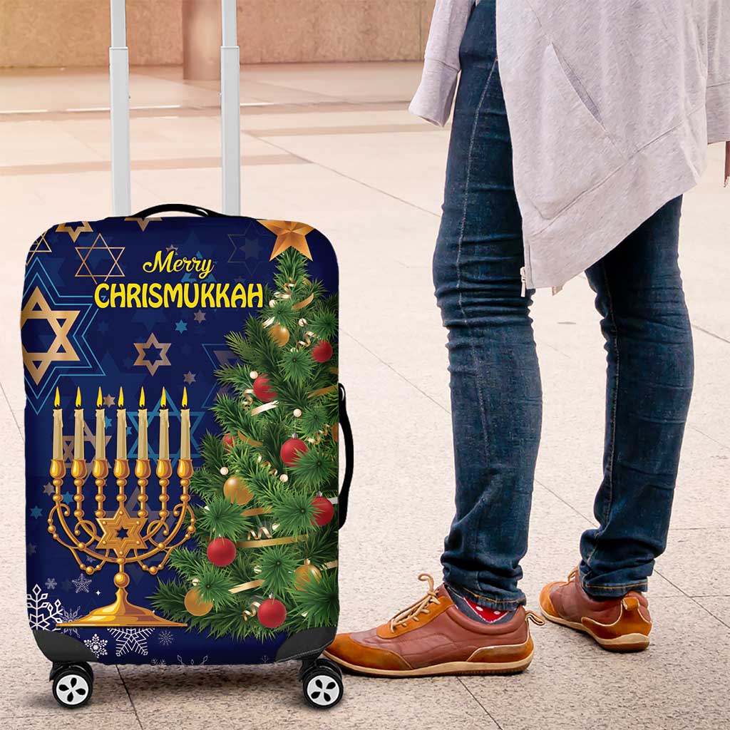 Blue luggage cover with “Merry CHRISMUKKAH” print, menorah, tree and star icons; wheeled