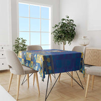 Blue square tablecloth with Hanukkah symbols and Star-of-David icons, border trim