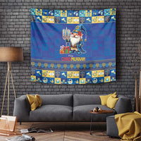 Blue Chrismukkah tapestry with gnome holding menorah and gifts, decorative border pattern