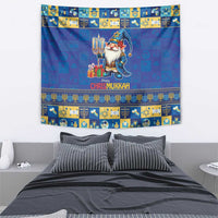 Blue Chrismukkah wall tapestry with gnome holding menorah, gifts, and decorative border
