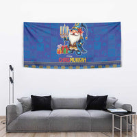 Blue Chrismukkah tapestry featuring gnome with menorah and gifts, “Happy Chrismukkah” border