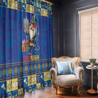 Blue and gold holiday window curtains with standing gnome design and patterned border trim.