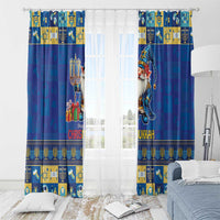 Blue holiday curtains with gnome character and menorah icons, hung with rings on rod.