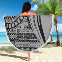 Round black and white beach blanket with tribal geometric design and white fringe tassels