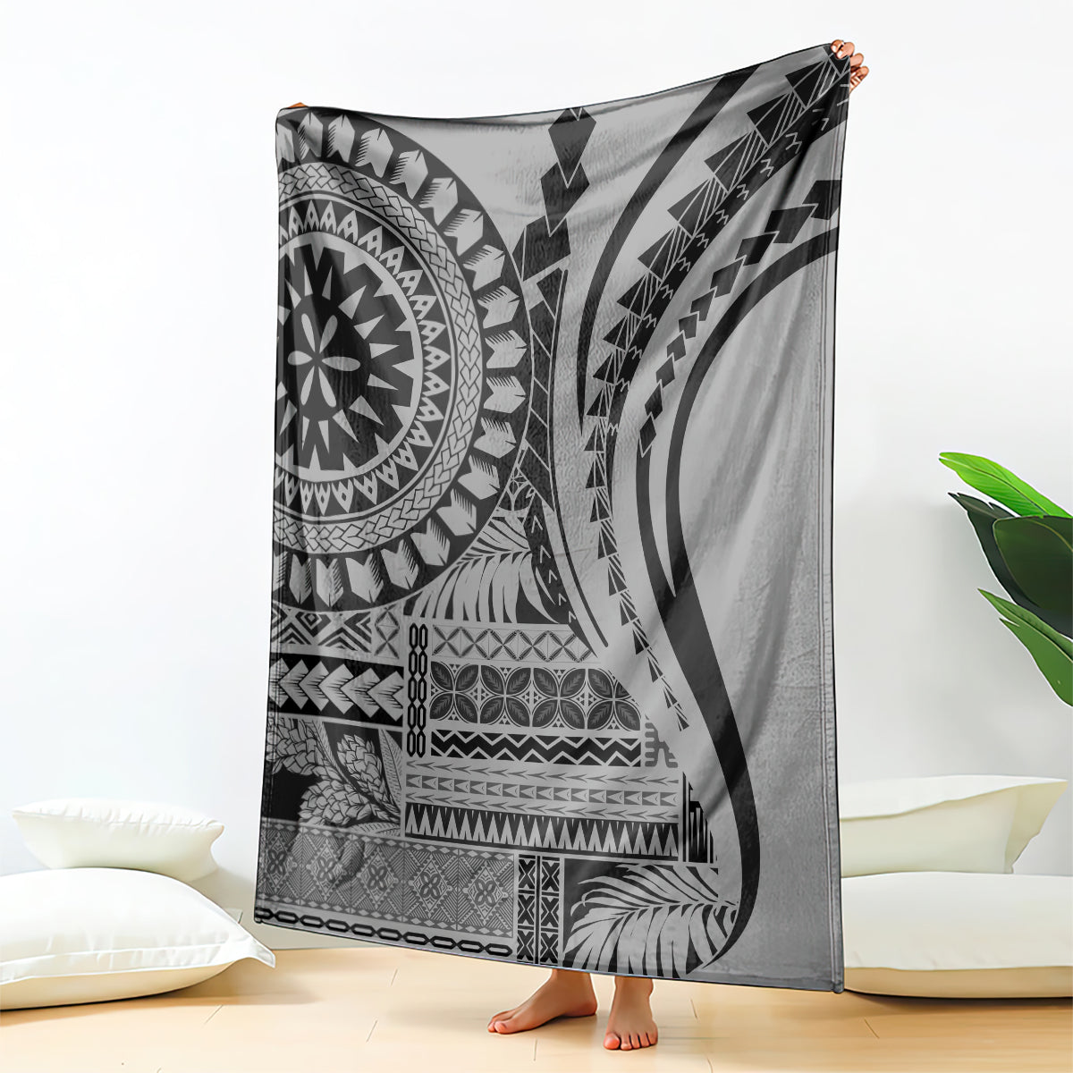 Black siapo art throw blanket with large circular tribal motifs and geometric bands