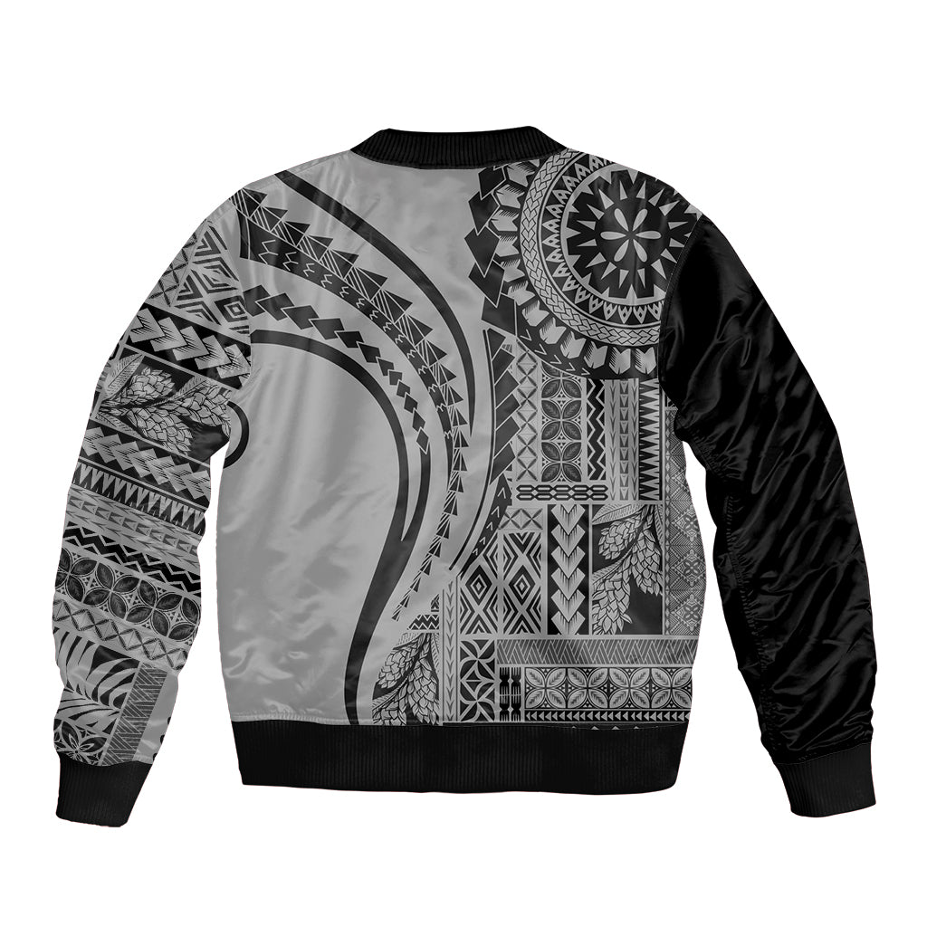Black bomber jacket with large back geometric tribal artwork, ribbed cuffs and hem
