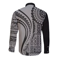 Black long-sleeve button shirt with grayscale geometric tapa print on the back