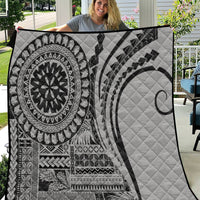 Black and white geometric quilt with circular mandala and crescent moon prints