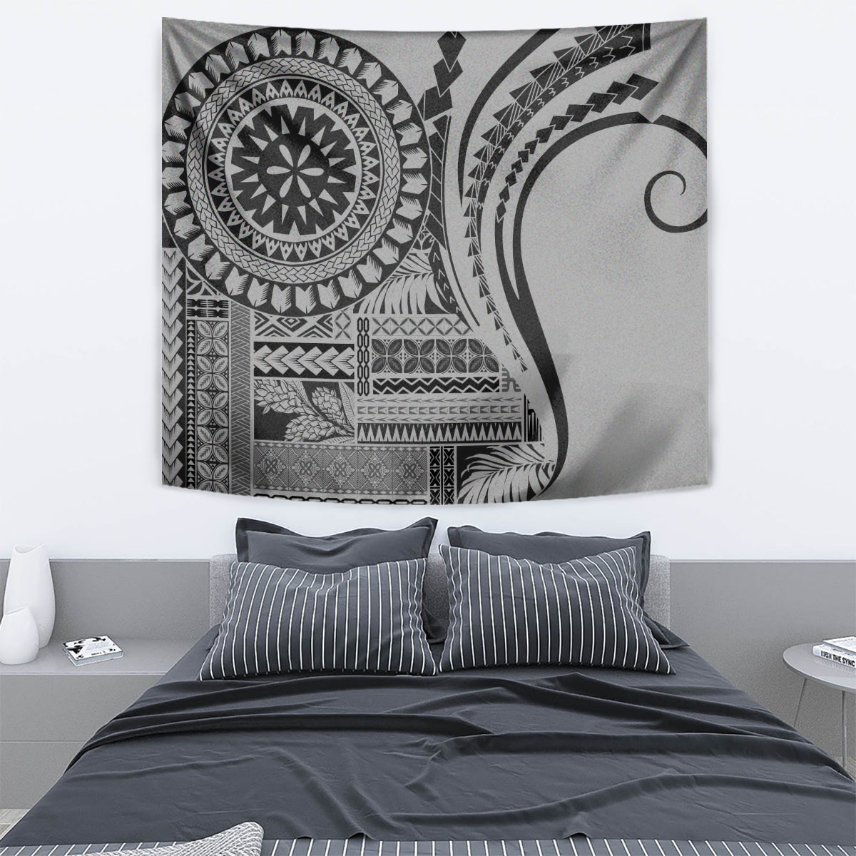 Black and gray siapo-style tapestry wall hanging with detailed geometric medallion