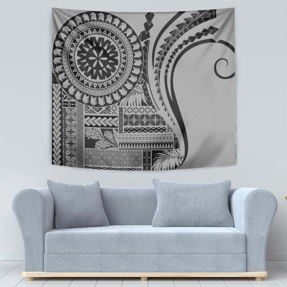 Black and gray geometric tapestry wall hanging with circular and curved tribal motif