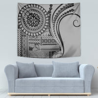 Black and gray geometric tapestry wall hanging with circular and curved tribal motif
