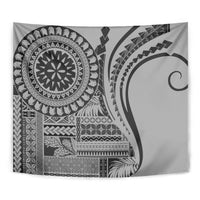Black and gray siapo-style tapestry featuring a bold circular medallion and curved lines