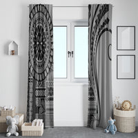 Black and white window curtains with detailed mandala prints and curved arc accents