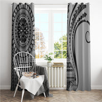 Black and white pair of window curtains with mandala center design and curved stripe graphic
