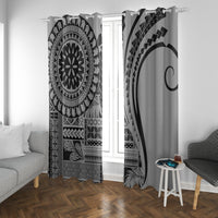 Black and white window curtains with bold mandala print and curved arc motif