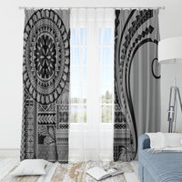 Black and white window curtains with geometric mandala and curved arc designs, partially open