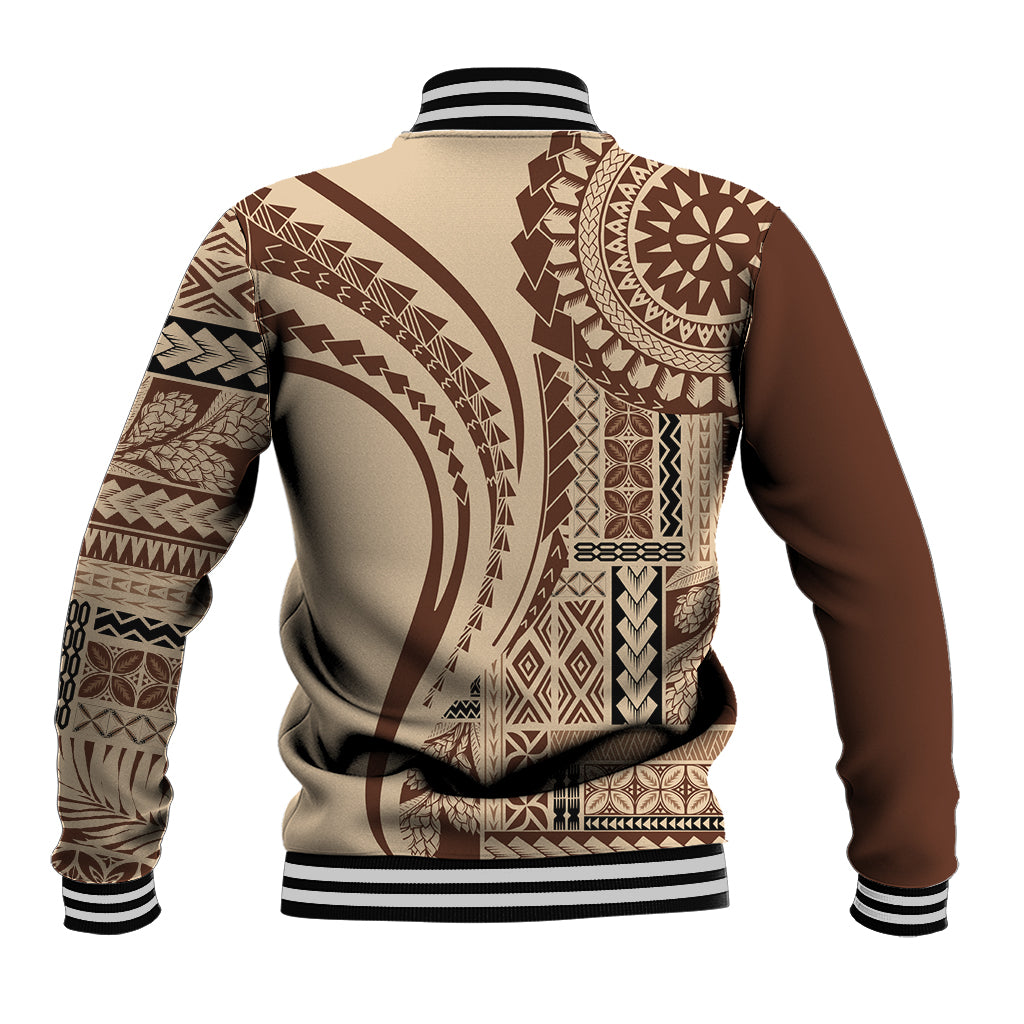 Brown and tan baseball jacket back, arched tribal print, ribbed hem and striped cuffs