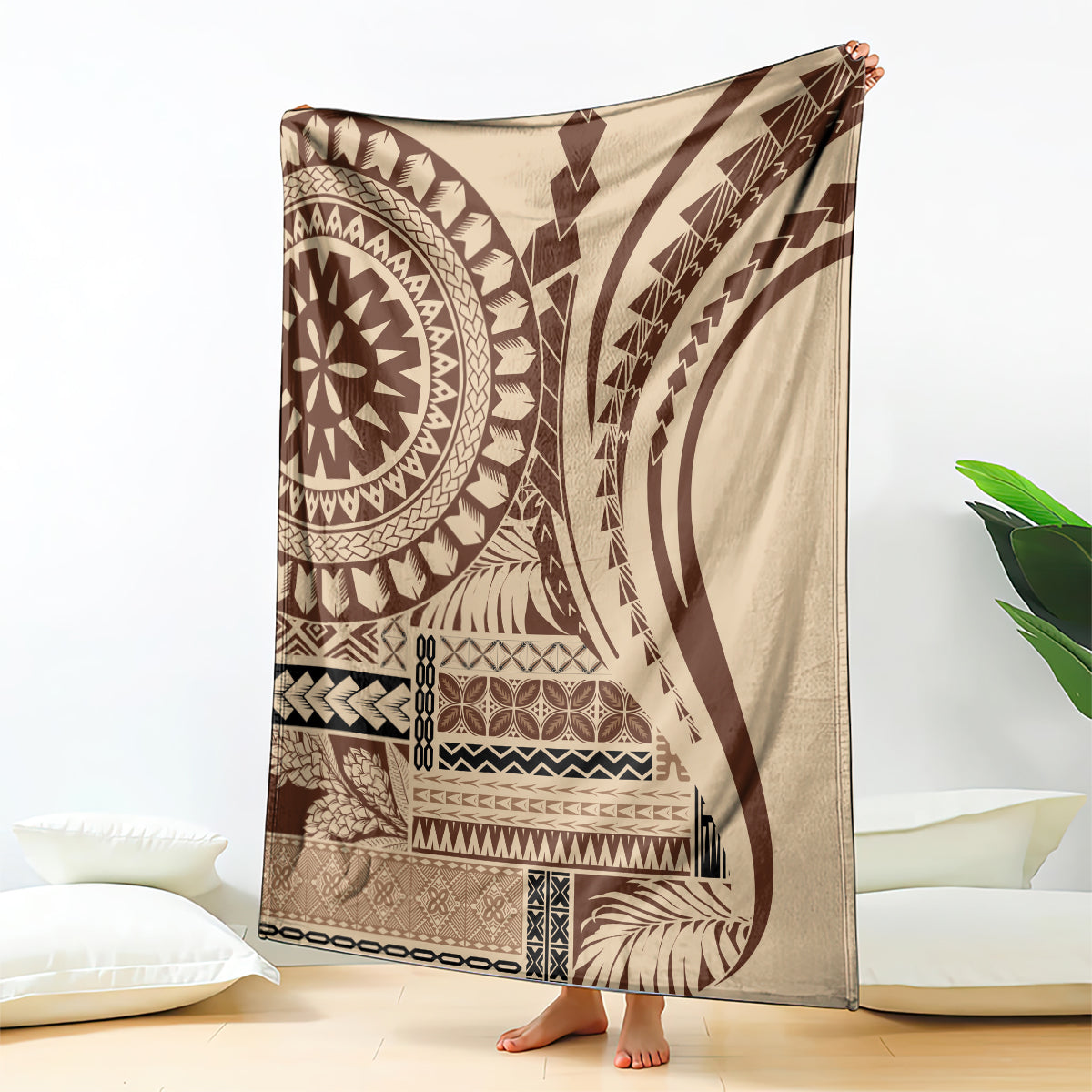 Brown and cream geometric art blanket with circular and wave motifs, draped on floor