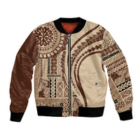 Brown bomber jacket with full-zip front, ribbed collar, and tribal patchwork print