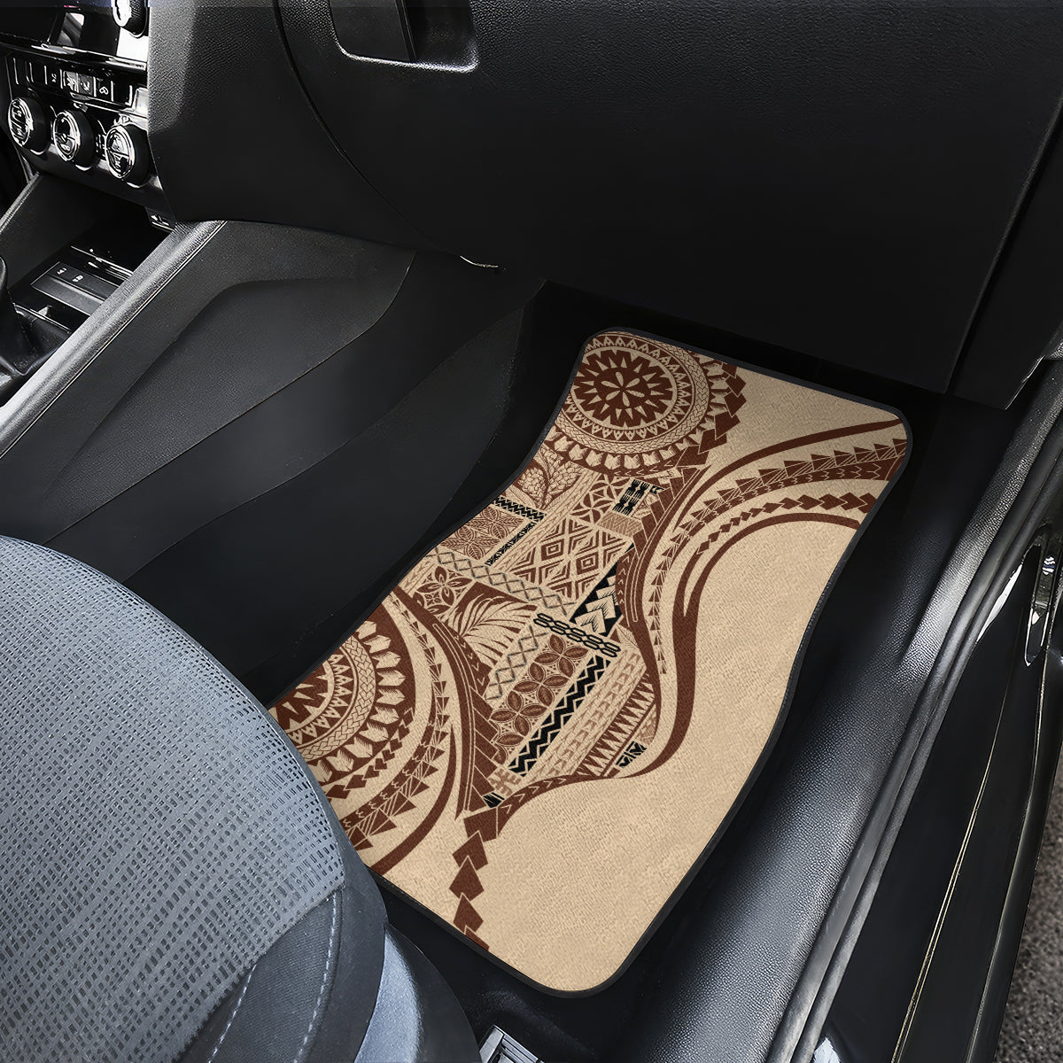 Brown patterned car floor mat on front passenger seat floor