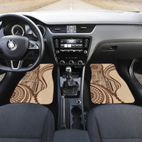 Pair of brown patterned car floor mats on front seats footwells