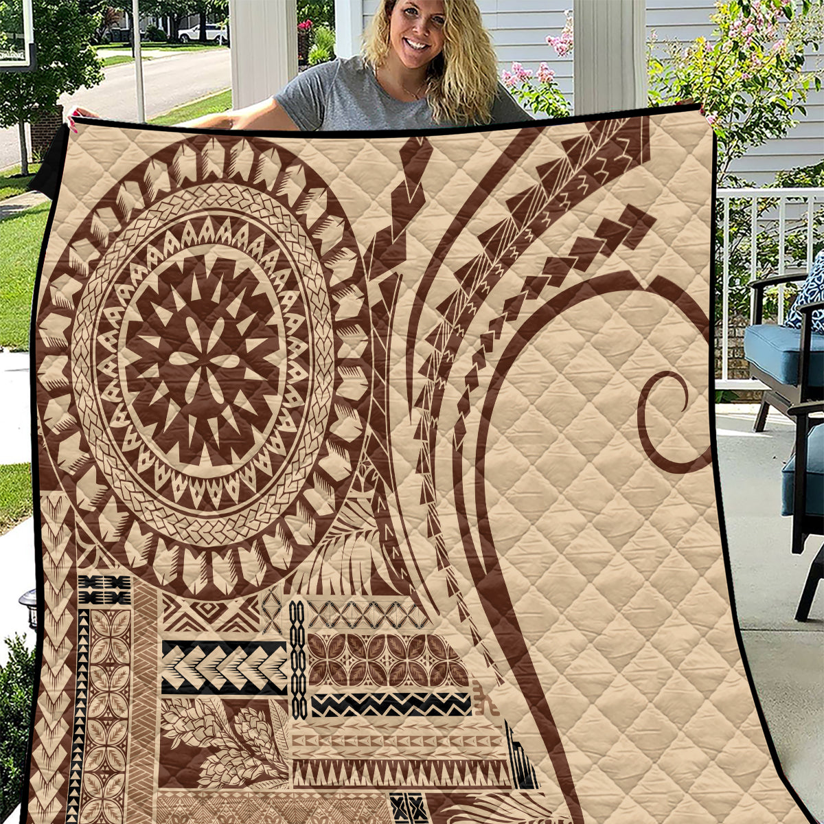 Brown Samoa Siapo-style arty quilt with oval sun emblem and tribal geometric panels