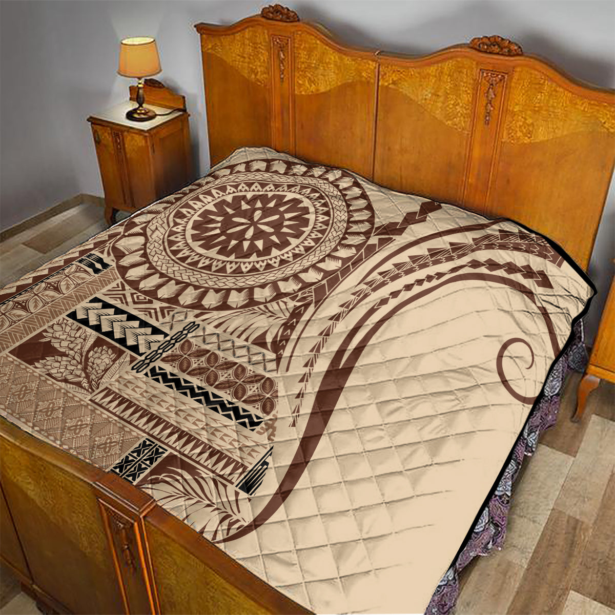 Brown and cream Samoa Siapo-style quilt with oval sun medallion and arched swirl motif on bed